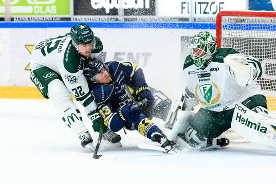 Färjestads Magnus Nygren och HV71s Måns Lindbäck och