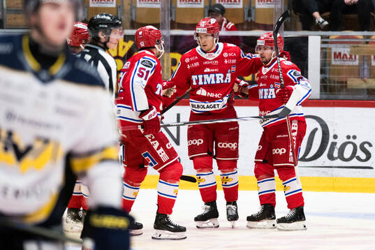 Timrås Filip Hållander och Anton Lander jublar