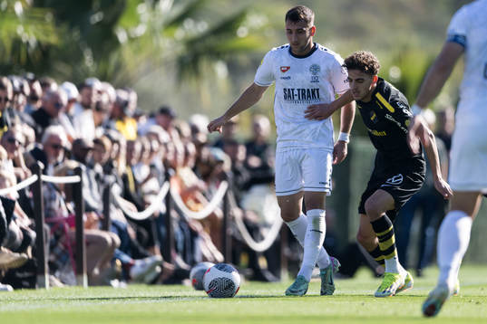 Nemanja Stojic of FK TSC Backa Topola and Taha Ayari of AIK