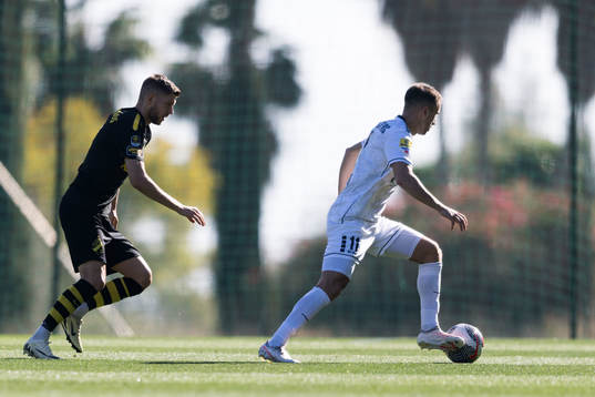 Anton Salétros of AIK and Ivan Milosavljevic of FK TSC