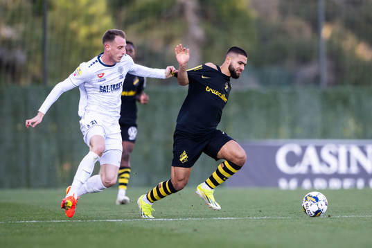 Nikola Kuveljic of FK TSC Backa Topola and Omar Faraj of AIK