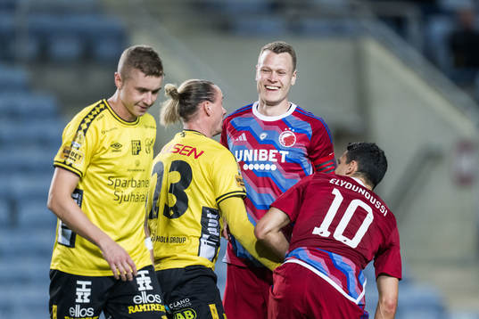 Sebastian Holmén and Niklas Hult of Elfsborg and Viktor
