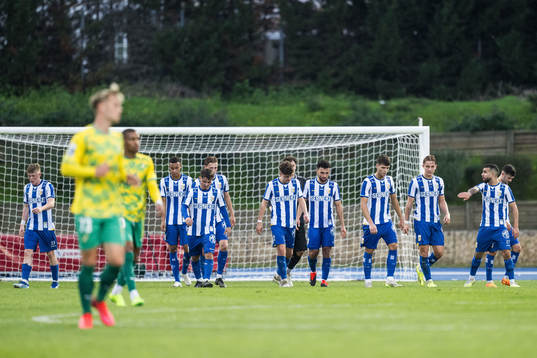 Players of IFK Göteborg look dejected