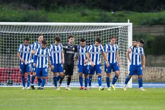 Players of IFK Göteborg look dejected
