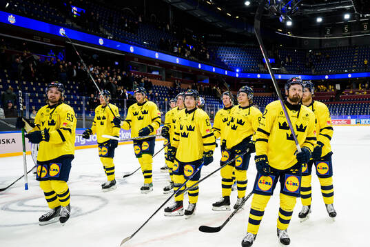 Players of Sweden celebrate