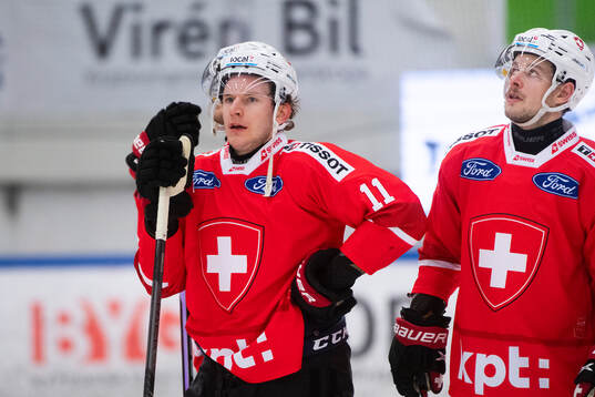 Switzerland looks dejected during the Beijer Hockey Games