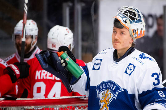 Goalkeeper Emil Larmi of Finland looks dejected during the