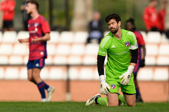Goalkeeper Jimmy Maurer of Dallas looks dejected
