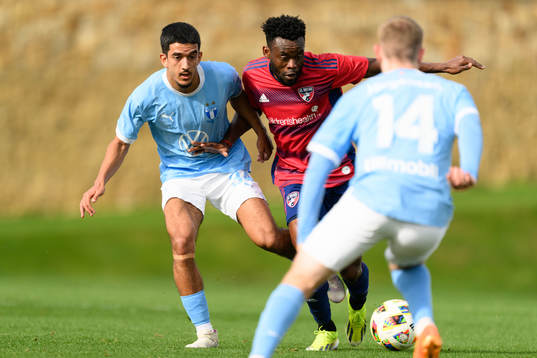 Zakaria Loukili of Malmö FF and Eugene Ansah of Dallas