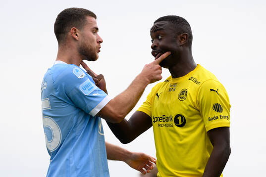 Gabriel Busanello of Malmö FF and Brice Wembangomo of