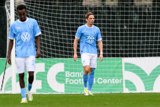 Taha Ali and Jens Stryger Larsen of Malmö FF looks dejected