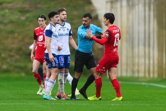 Ismet Lushaku and Yahya Kalley of IFK Norrköping and Svenn