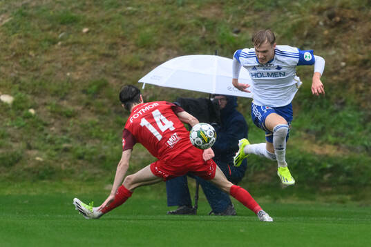 Ulrik Mathisen of Brann and Marcus Baggesen of IFK