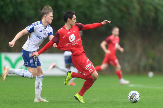 Isak Andri Sigurgeirsson of IFK Norrköping and Svenn Crone