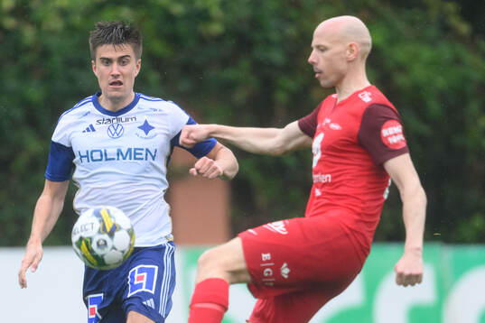 Carl Björk of IFK Norrköping and Ruben Kristiansen of