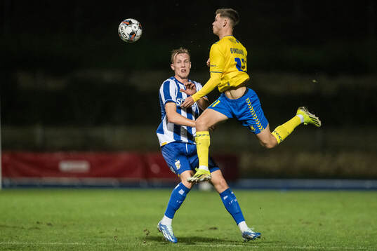 Adam Carlén of IFK Göteborg and Filip Bundgaard of