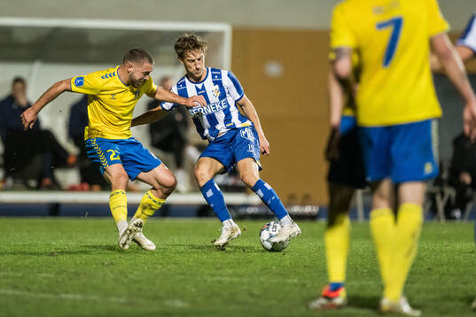 Josip Radosevic of Brøndby and Arbnor Mucolli of IFK