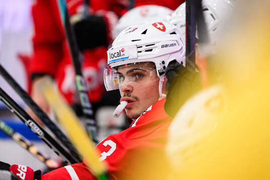Sandro Schmid of Switzerland looks dejected