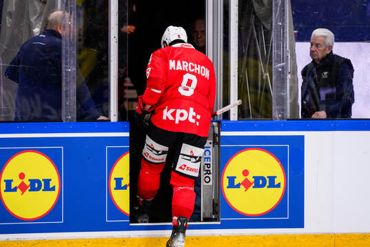 Marc Marchon of Switzerland leaves the ice
