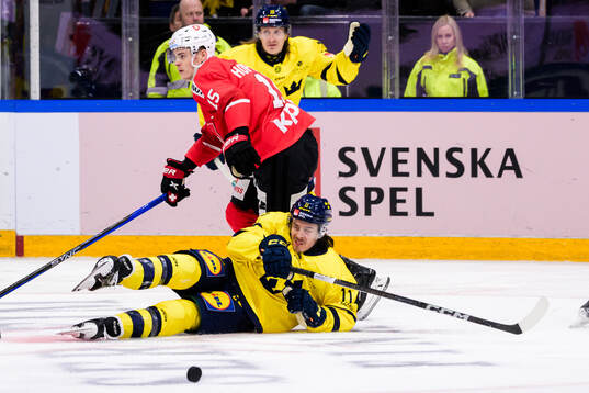 Gregory Hofmann #15, SUI of Switzerland and Joakim Nygård