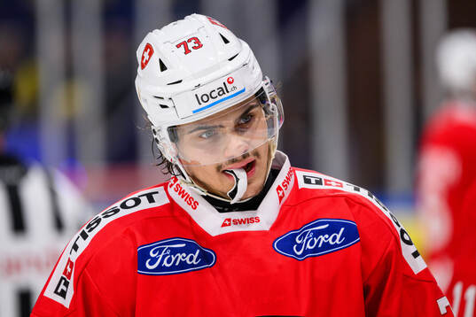 Sandro Schmid of Switzerland looks dejected