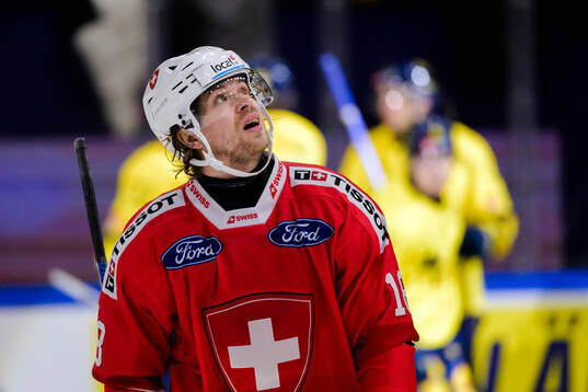 Sven Jung of Switzerland looks dejected