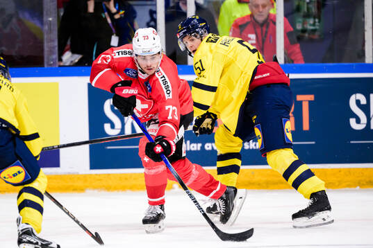 Sandro Schmid of Switzerland and Filip Hållander of Sweden