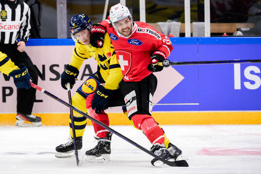 Filip Hållander of Sweden and Julian Schmutz of Switzerland