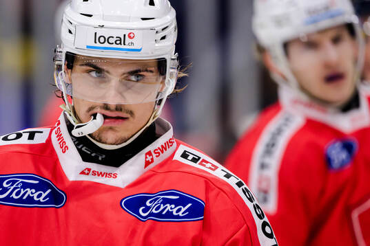 Sandro Schmid of Switzerland looks dejected