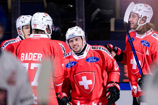 Axel Simic of Switzerland celebrates
