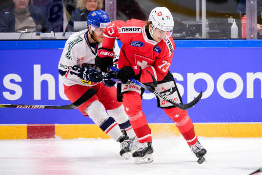 Oscar Flynn of Czech Republic and Sandro Schmid of