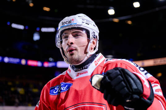 Axel Simic of Switzerland celebrates