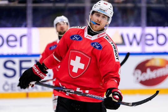 André Heim of Switzerland looks dejected
