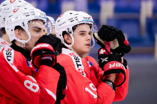 Théo Rochette of Switzerland looks dejected