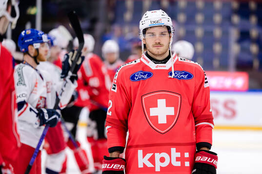 Yannick Zehnder of Switzerland looks dejected