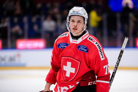 Tino Kessler of Switzerland looks dejected