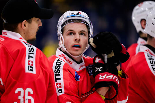 Tino Kessler of Switzerland looks dejected
