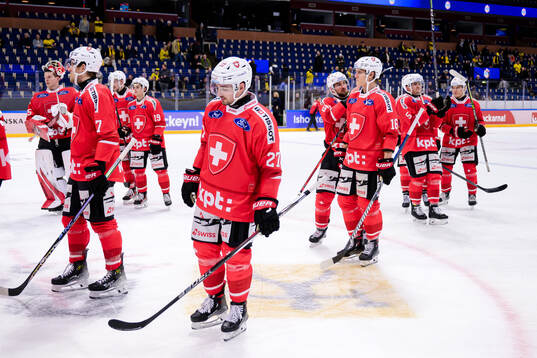 Players of Switzerland looks dejected