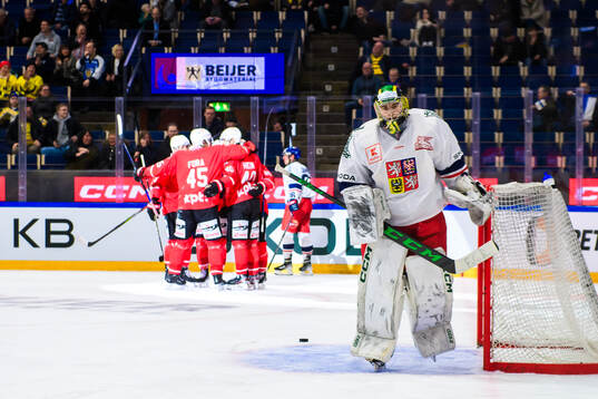 goaltender Jakub Málek of Czech Republic looks dejected