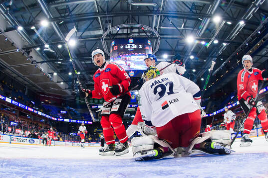 Tyler Moy of Switzerland celebrates