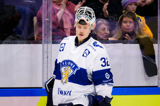 goaltender Emil Larmi of Finland
