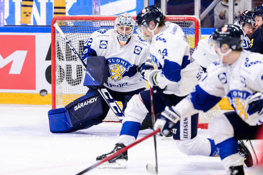 goaltender Emil Larmi of Finland