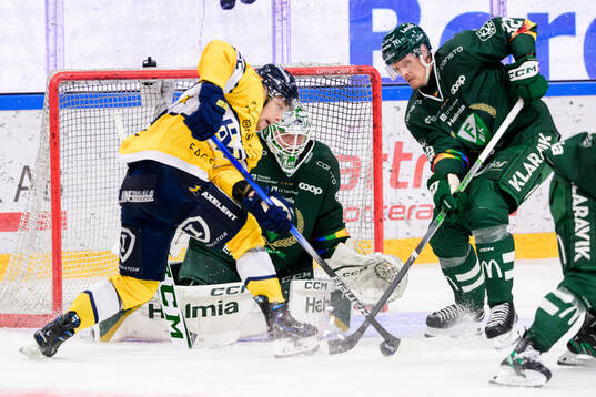Färjestads målvakt Maxime Lagacé och Magnus Nygren