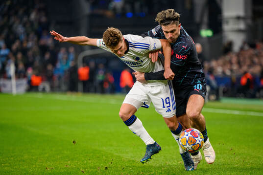Elias Jelert of FC Copenhagen and Jack Grealish of