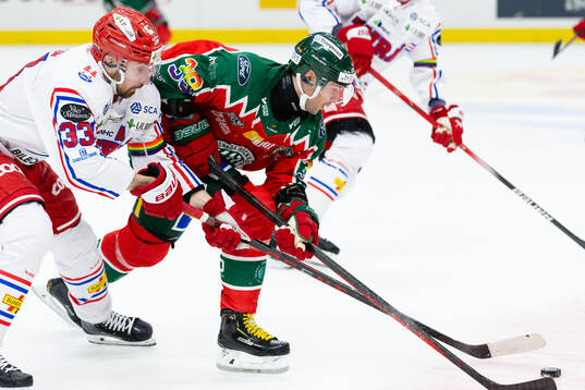Timrås Albin Lundin och Frölundas Mikael Ruohomaa