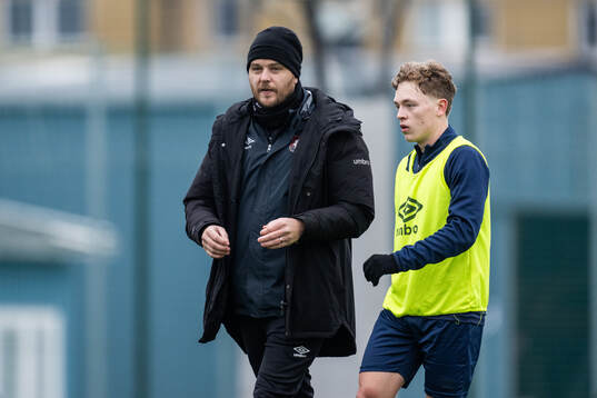 Tränare Andreas Holmberg och William Alder