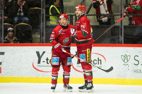 MoDos Sam Vigneault och Sebastian Ohlsson jublar