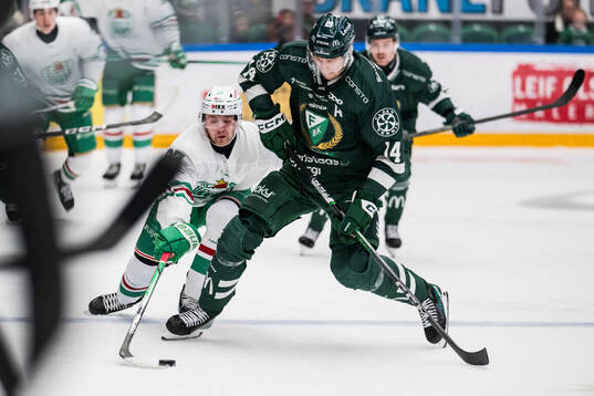 Rögles Linus Sjödin och Färjestads Victor Ejdsell
