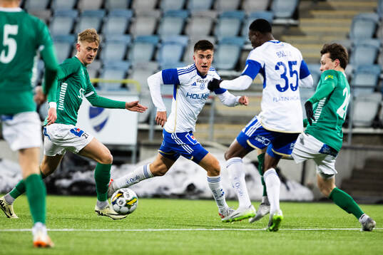 Brages Henry Sletsjøe och IFK Norrköpings Carl Björk