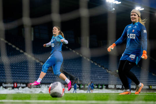 Maren Mjelde and goalkeeper Guro Pettersen of the Norwegian